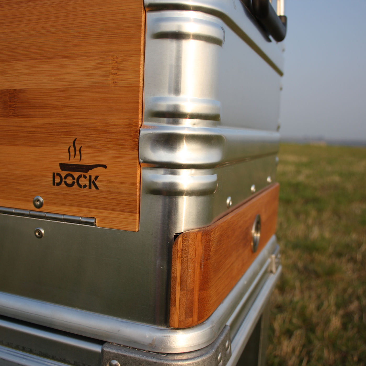 Laser-engraved DOCK logo on the bamboo panel